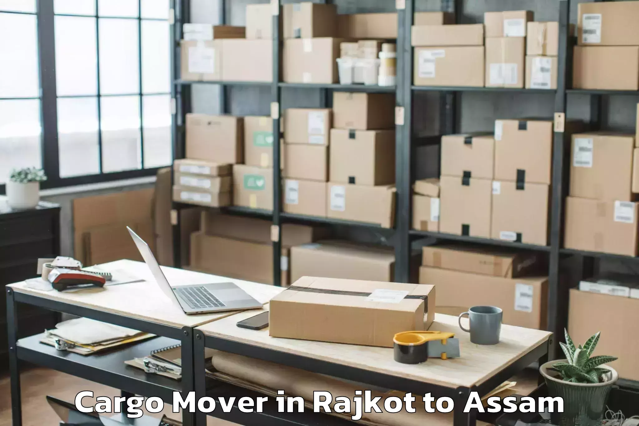 Hassle-Free Rajkot to Kharupetia Cargo Mover